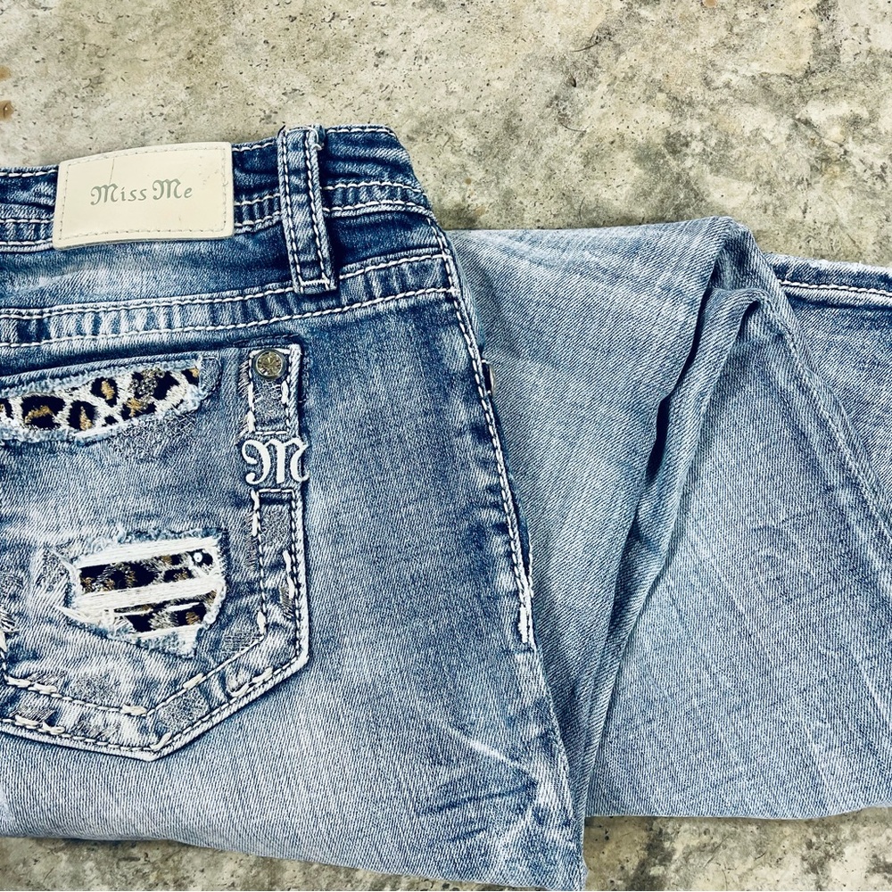 Miss Me Blue Mid Rise Skinny cut Jeans with Distressed Animal Print Details